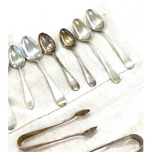 569 - Selection 16 silver hallmarked spoons, various dates, 2 silver sugar tongs, approximate total weight... 