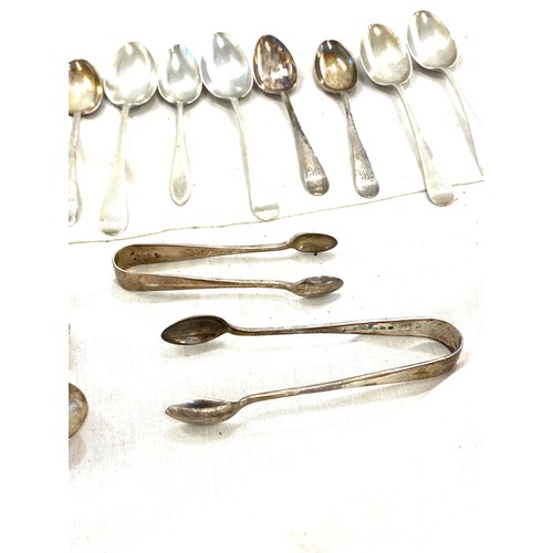 569 - Selection 16 silver hallmarked spoons, various dates, 2 silver sugar tongs, approximate total weight... 