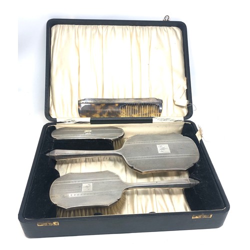 66 - Boxed antique silver brush set