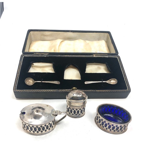 100 - Boxed silver cruet set with blue glass liners Birmingham silver hallmarks