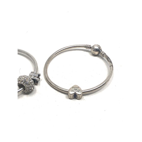 340 - 2 silver pandora bracelets & charms