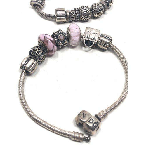 370 - 2 Pandora silver charm bracelets & charms