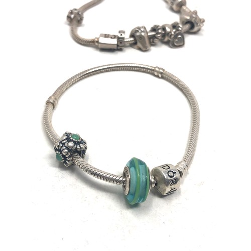 344 - 2 silver pandora bracelets & charms