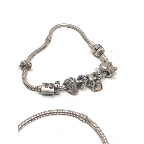 344 - 2 silver pandora bracelets & charms