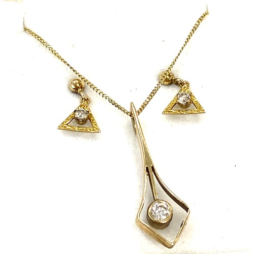 562 - Ladies 9ct Diamond necklace and earring set