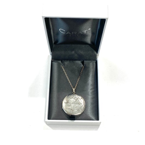 559 - Ladies hallmarked silver locket and chain