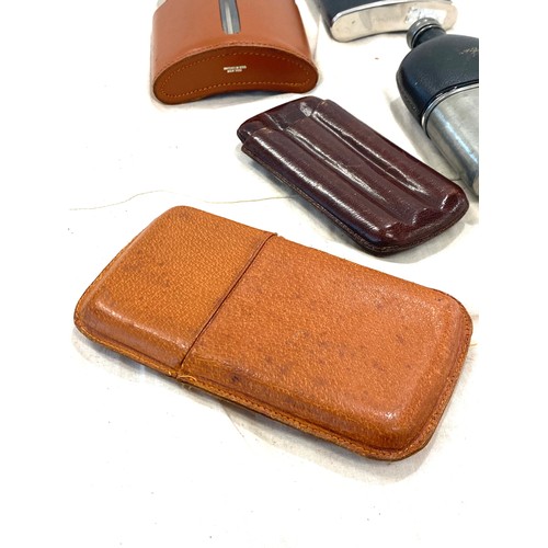 583 - Selection of cigar cases and drink flasks