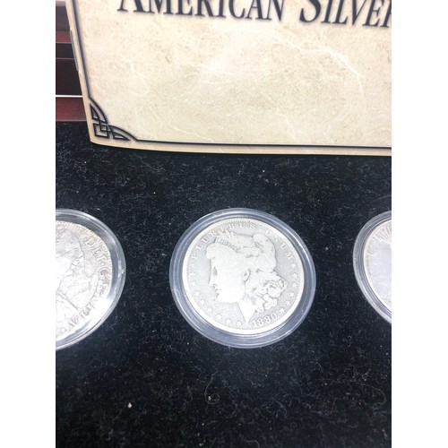 420 - Boxed four centuries of American silver dollars