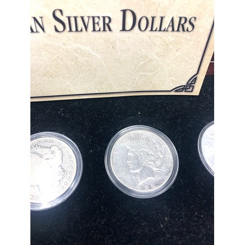 420 - Boxed four centuries of American silver dollars