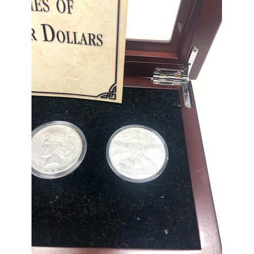 420 - Boxed four centuries of American silver dollars