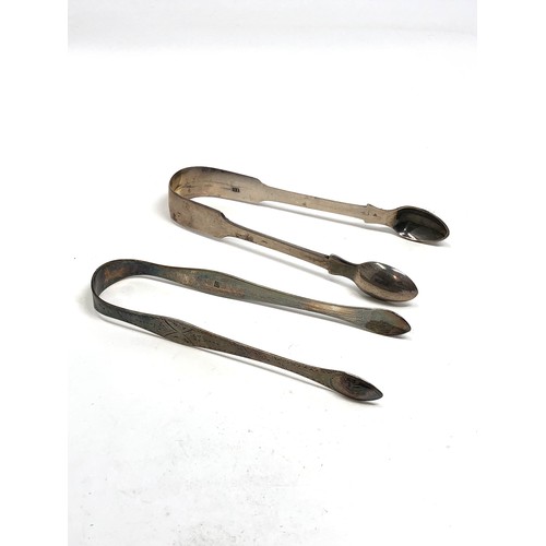 89 - 2 georgian silver sugar tongs weight 82g