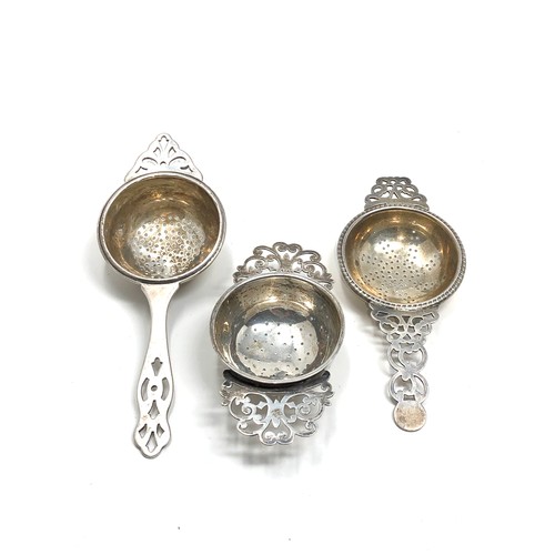 68 - 3 silver tea strainers weight 110g