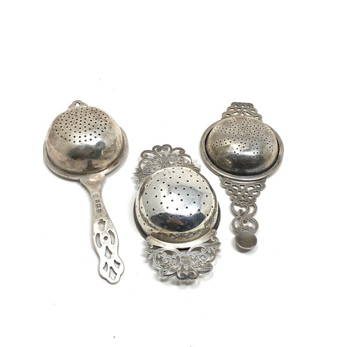 68 - 3 silver tea strainers weight 110g