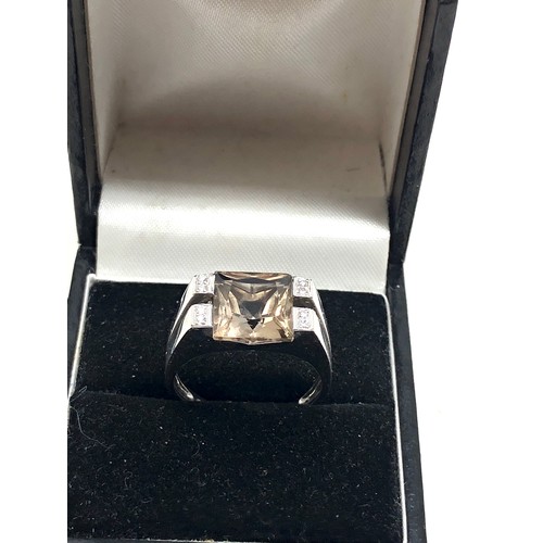 125 - 9ct white gold diamond & smoky quartz  ring weight 4.9g