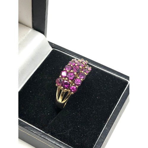 127 - 9ct gold synthetic ruby ring weight 4g