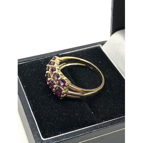 127 - 9ct gold synthetic ruby ring weight 4g