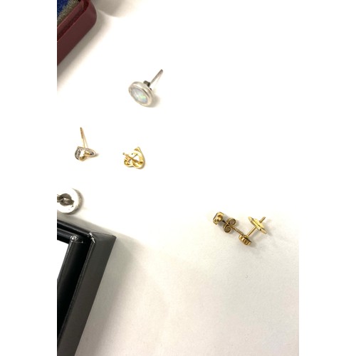 596 - 3 Pairs of silver earrings and 1 pair of gold earrings