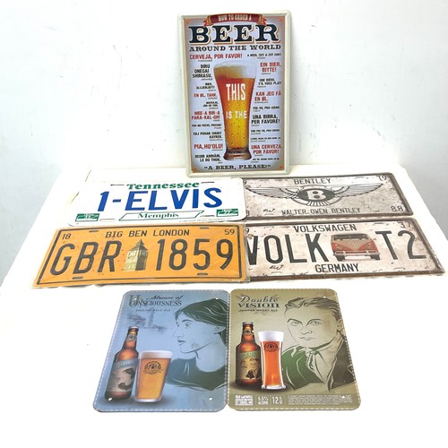 574 - Selection of 7 advertising metal wall and number plates signs