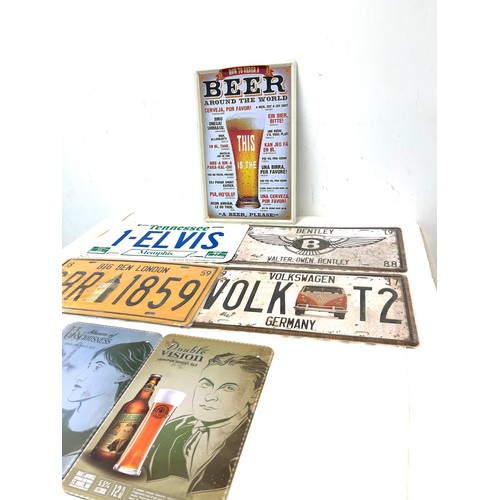 574 - Selection of 7 advertising metal wall and number plates signs