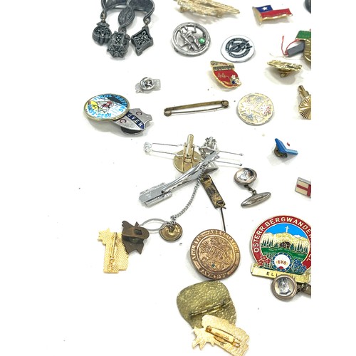 543 - Selection of vintage and later badges, selection of untested watches