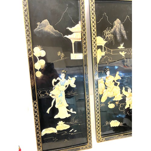 158 - 2 Oriental lacquered wall plaques, approximate measurements: 28