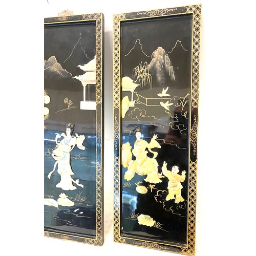 158 - 2 Oriental lacquered wall plaques, approximate measurements: 28