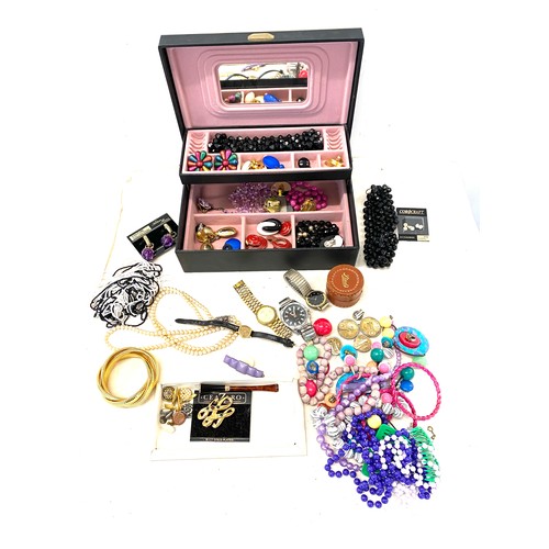 567 - Large selection of costume jewellery in a jewellery box