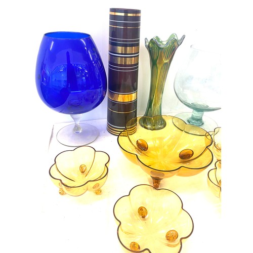 285 - Selection of coloured glassware includes vases, dessert dishes etc