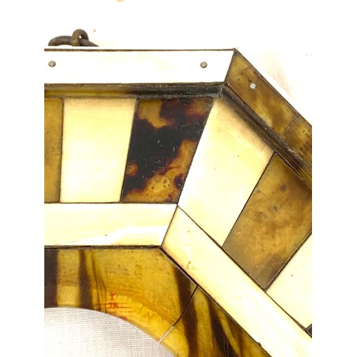 558 - Tortoiseshell and ivory octagonal photo frame measures approximately 6 inches by 6 inches