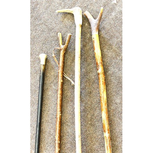 128 - 4 Vintage wooden walking sticks