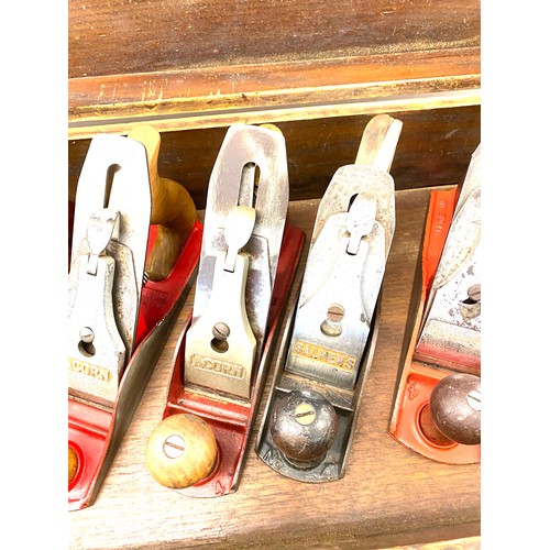 276 - 7 vintage Wood planes in a wooden tool box includes hilkers, acorns, salmons etc