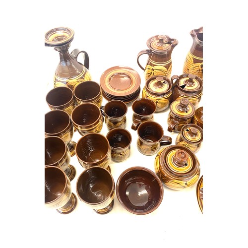 224 - Large selection of studio pottery ware, includes part dinner service marks to base etc