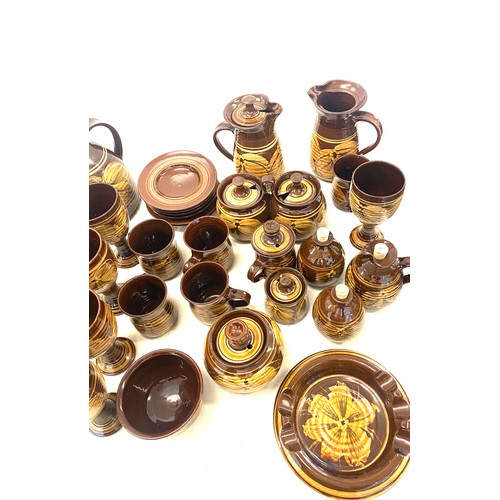 224 - Large selection of studio pottery ware, includes part dinner service marks to base etc