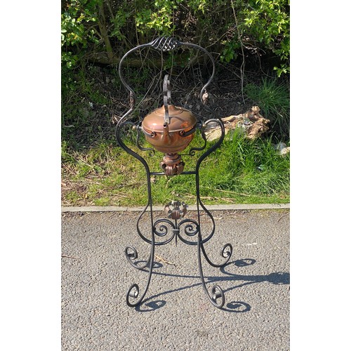 248 - Antique copper spirit kettle on wrought iron stand