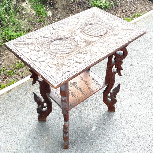 435 - Carved top and bottom occasional table measures approx 326