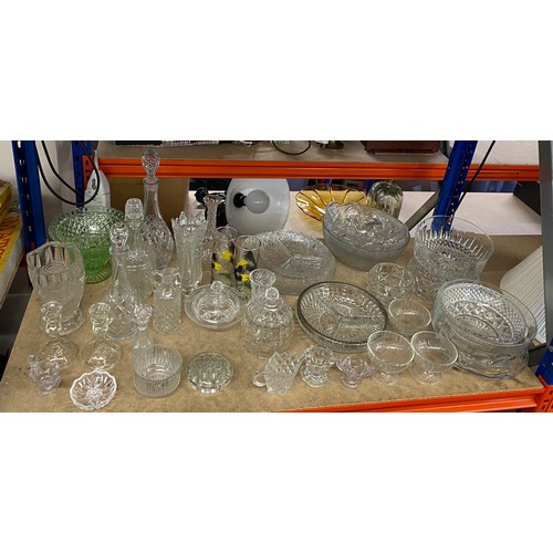 394 - Large selection of vintage and later glassware to include decanters etc