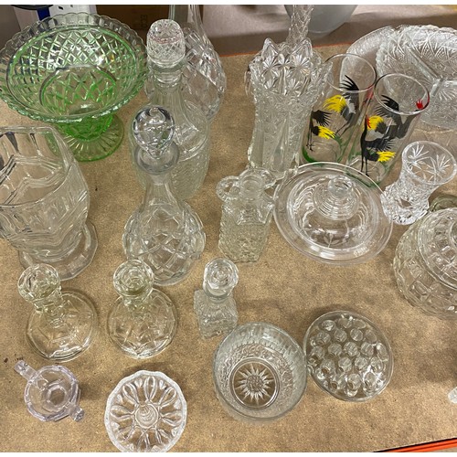 394 - Large selection of vintage and later glassware to include decanters etc