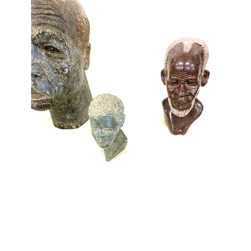 108 - 6 Carved stone heads, largest measures 20 inches tall