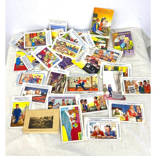 584 - Large selection of vintage characteristic postcards