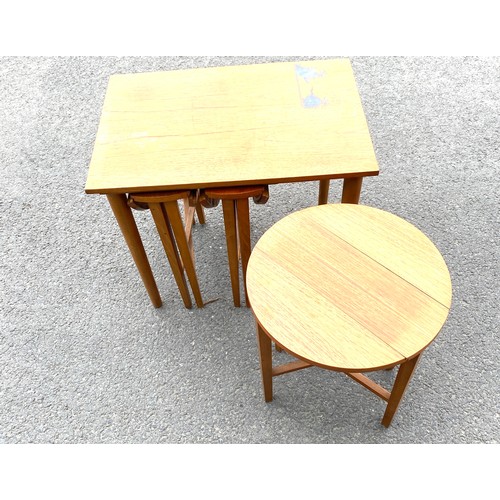 427 - Vintage nest of 4 tables, with damage to the top measures approx 21