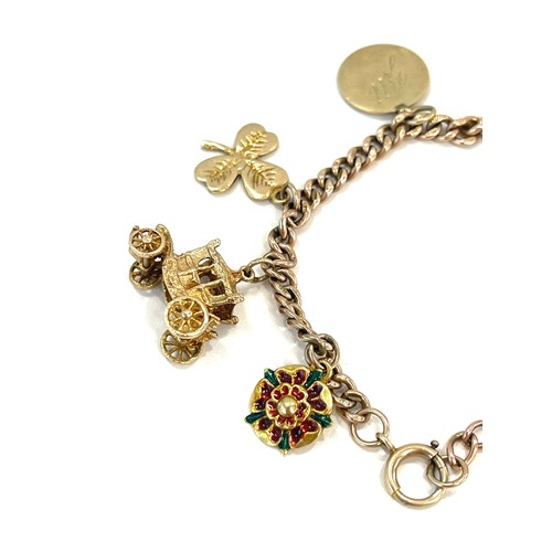 580 - Vintage 9ct gold charm bracelet and charms total weight approx 32g,