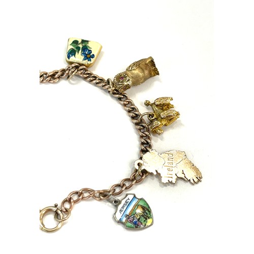 580 - Vintage 9ct gold charm bracelet and charms total weight approx 32g,