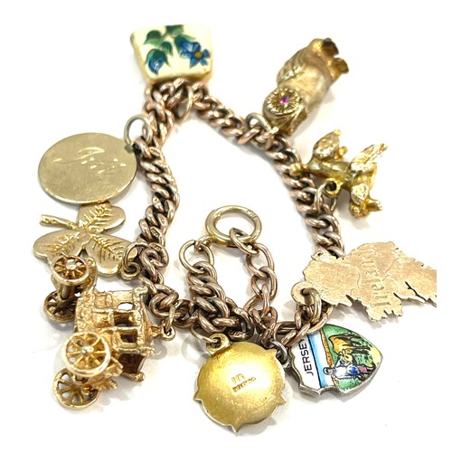 580 - Vintage 9ct gold charm bracelet and charms total weight approx 32g,