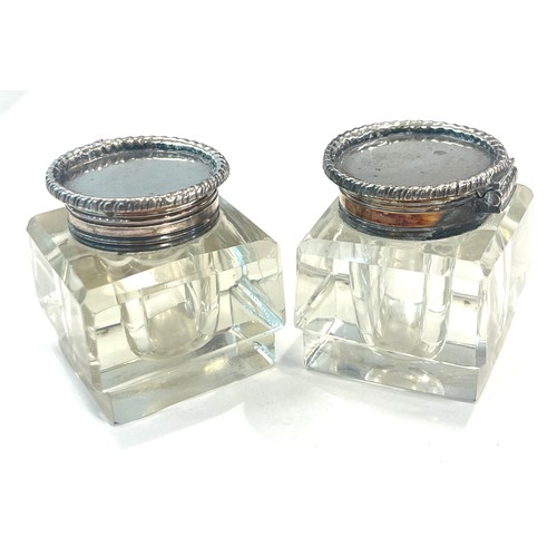 562 - Pair antique inkwells