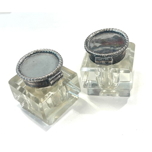 562 - Pair antique inkwells