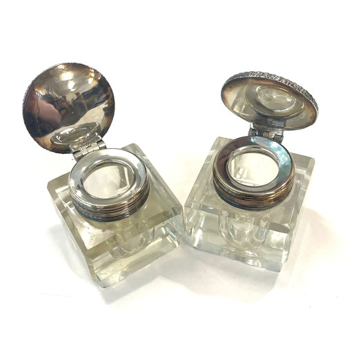 562 - Pair antique inkwells