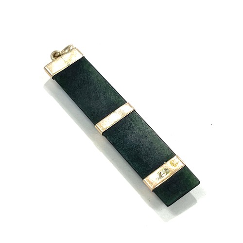 536 - New Zealand 9ct gold and Jade Pendant, marked 9ct