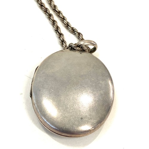 517 - Victorian unmarked silver locket and chain