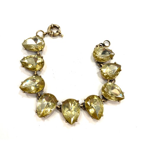 513 - Yellow metal bracelet set with yellow stones