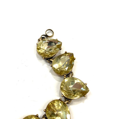 513 - Yellow metal bracelet set with yellow stones